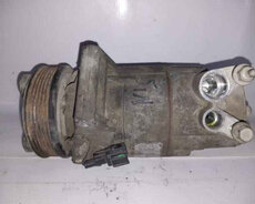 Kompressor kondisioner Nissan Almera 2014